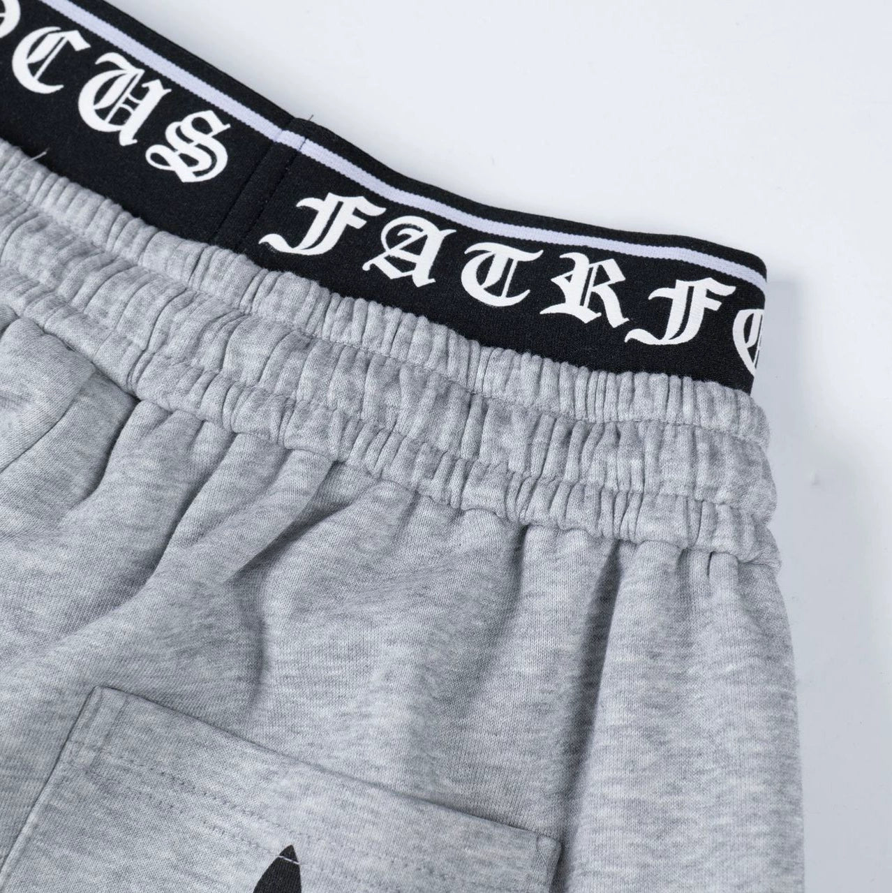 Layered Waistband Cross Sweatpants